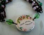 love never faileth bracelet