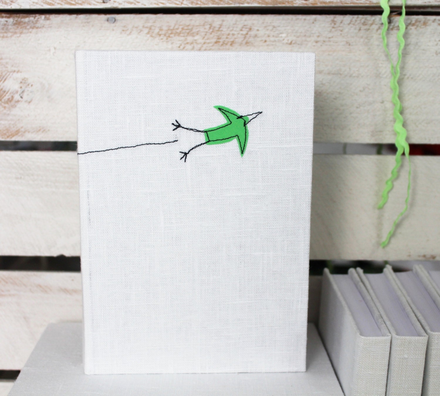 Bound notebook with appliqued fabric cover- bird