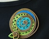 Multi colored abstract felt and zipper brooch