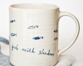 Fish With Shadows. Slip Decorated Ceramic Cup