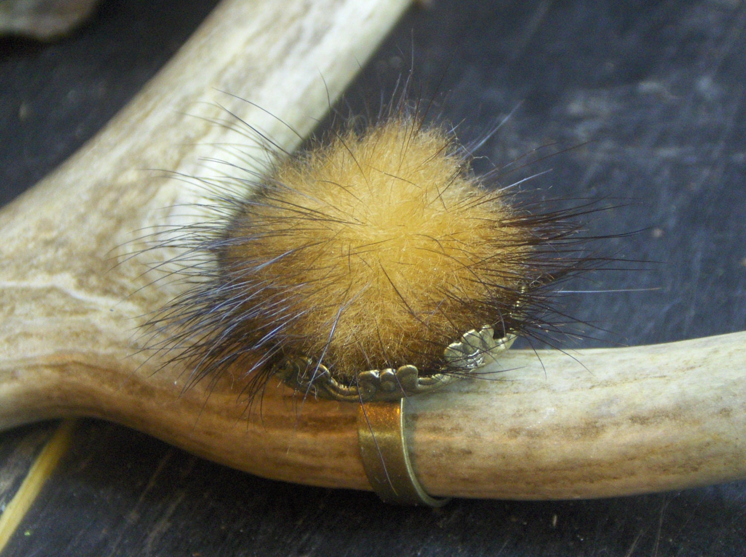 MINK BABY. Genuine Mink Fur ball in brass cown setting- ring