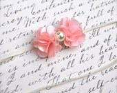 Baby mini pink satin and pearl flower headband on skinny elastic. Photo prop. Flower girl, baby girl, newborn.