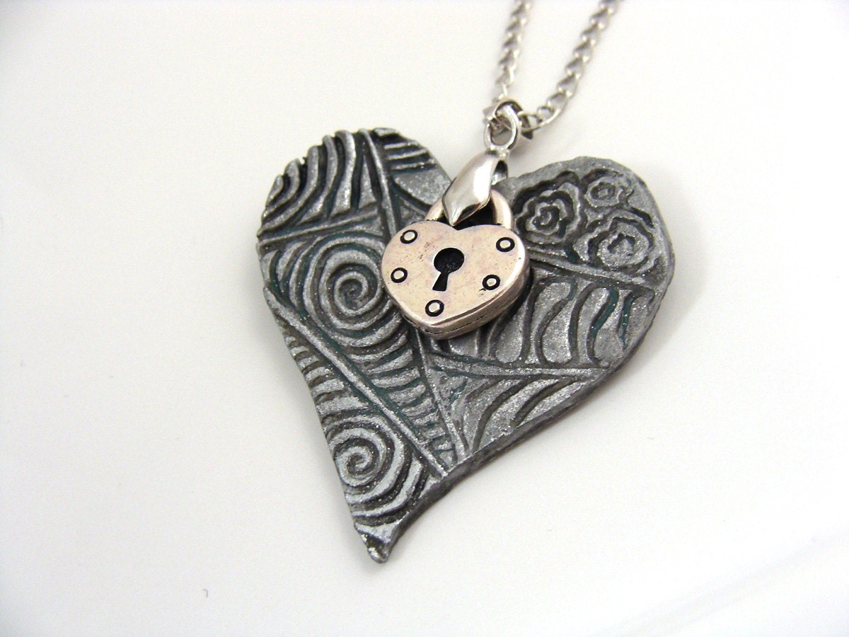 Two hearts silver pendant necklace on chain