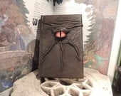 Mythical Beast Book (The Watchful Eye: Chocolate Brown  leather with Red Orange eye)