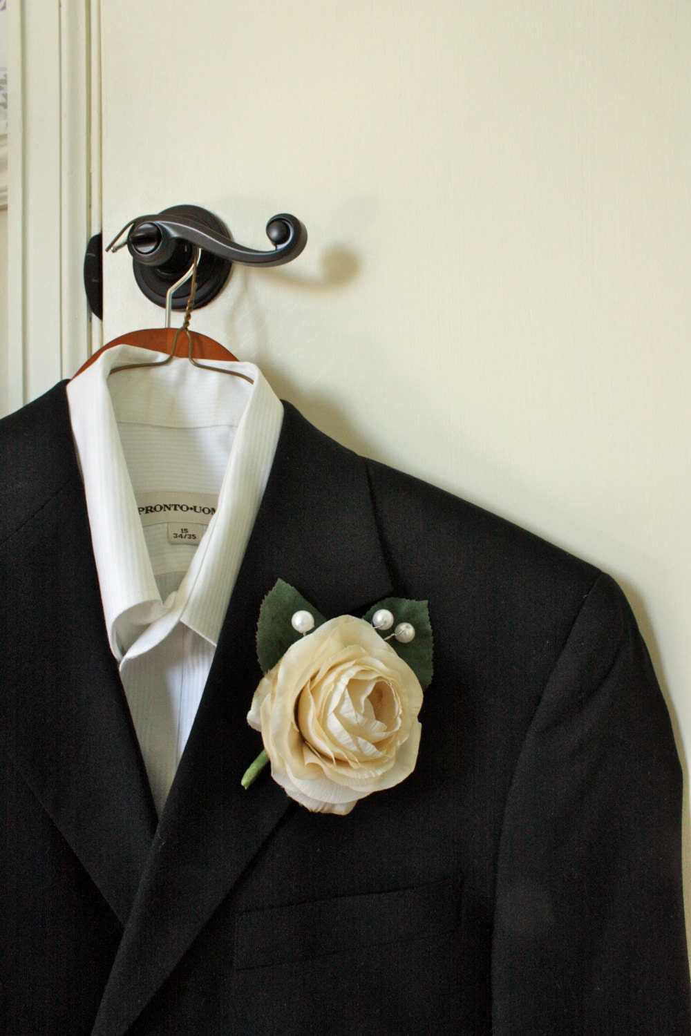Open Ranunculus Boutonniere in Ivory Cream