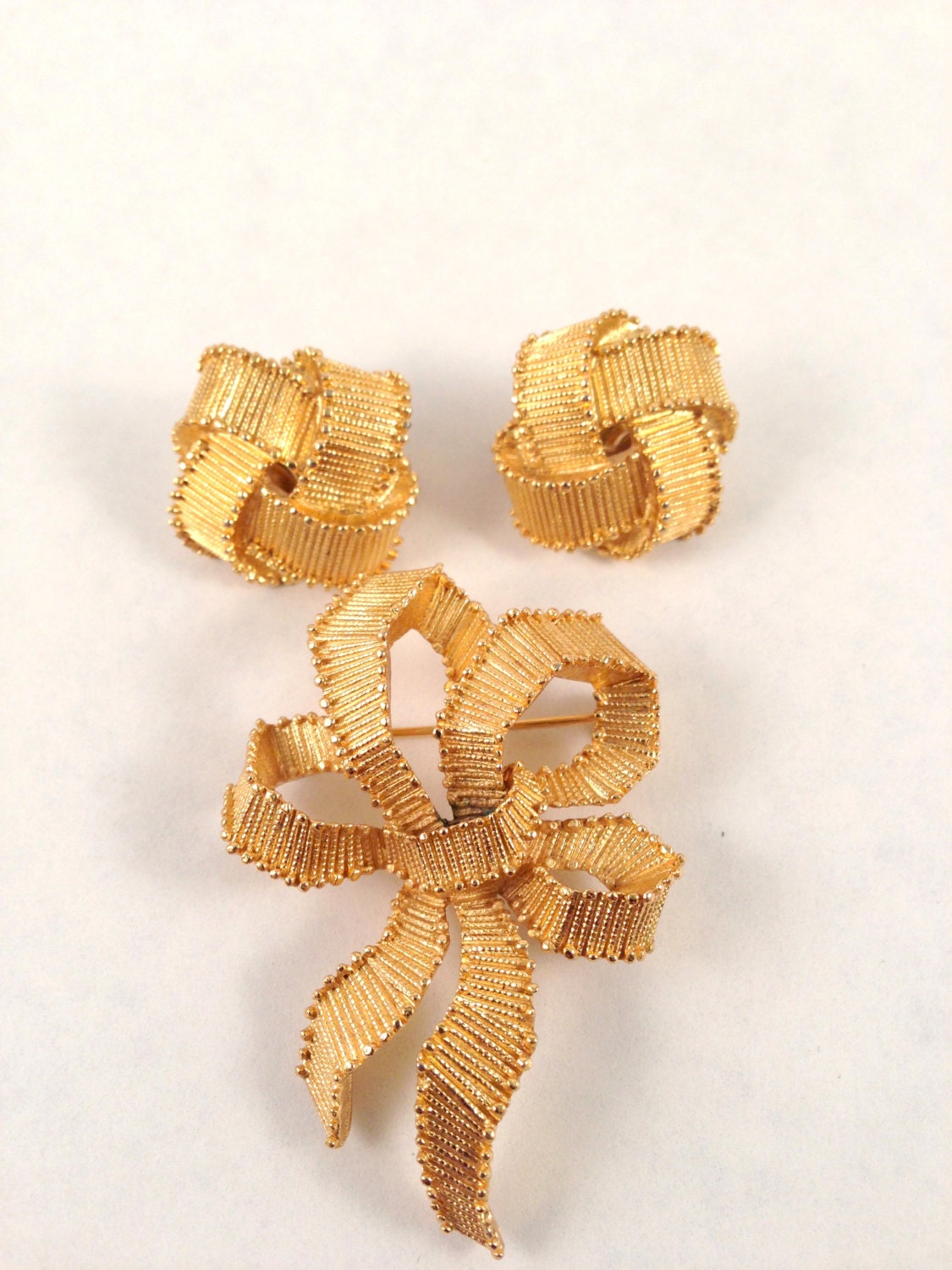 Vintage Trifari Gold Ribbon Bow Brooch & Earrings Set - gold toned metal in a textured ribbon pattern - pin - demi-parure