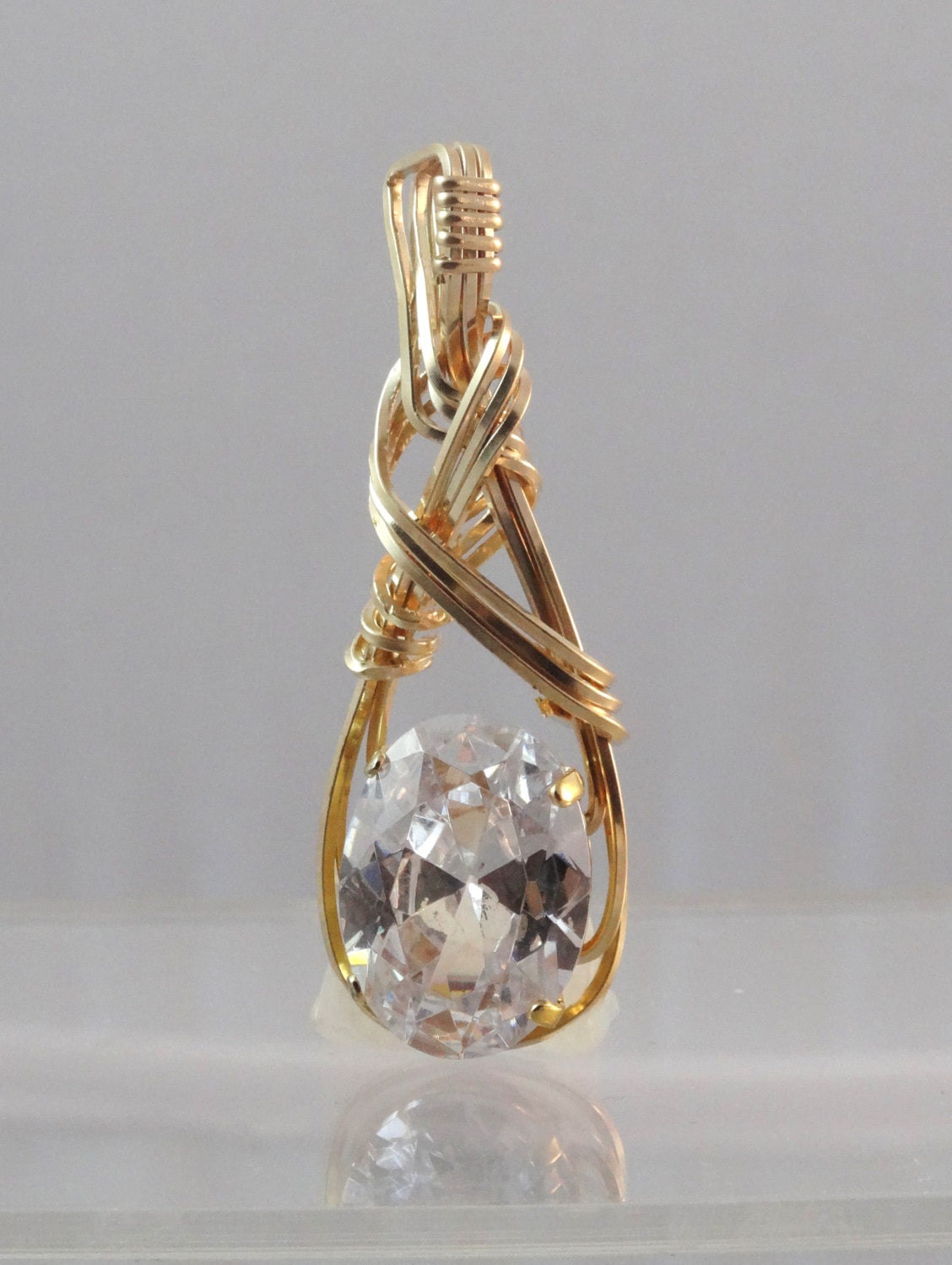 Trillion Zirconia Wire Wrapped In Gold