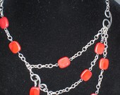 Asymmetric Recycled Red Glass and Antique Silver Necklace.