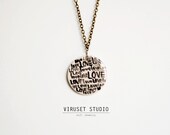 White ceramic pendant with LOVE word and bird for women. Minimalist and modern chain necklace. Completely handmade by Viruset Studio.