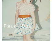 Take Flight Girl Twirl Skirt with Sash Airplane Print with Blue Green Cinnamon Spring Summer Collection from Fleur and Dot