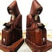 Vintage priest monk scholar bookends religious study