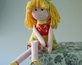 Earth friendly clothdoll, has bamboo yarn hair and is stuffed with bamboo fiber