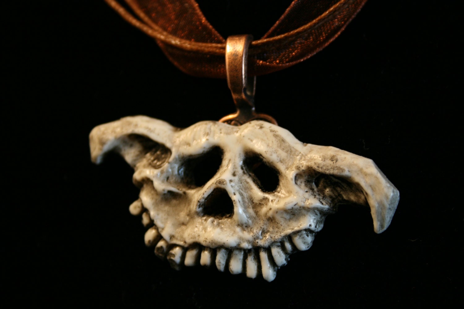 Zombie Dog Skull Pendant - Ash white with copper-tone necklace