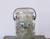 Clear and tinted creek glass in vintage Ball jar.