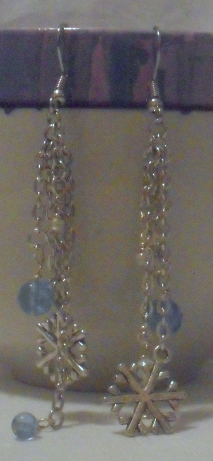 Dangling Snowflake Earrings featuring a Cascade of Glacial Blue and Opalescent Beads