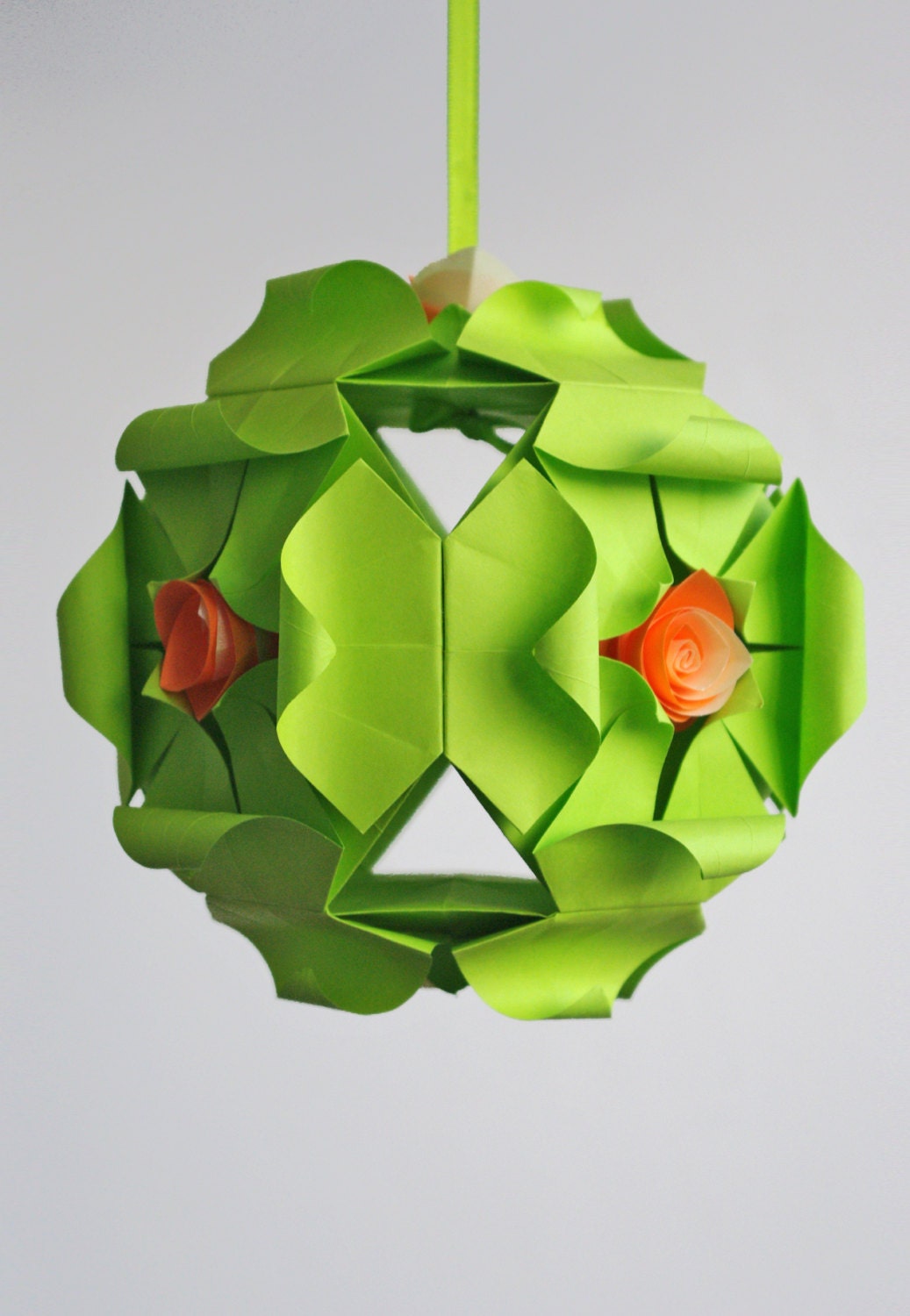 Origami paper ball. Kusudama with roses.