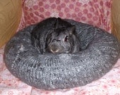 Ugli Donut rabbit bed for a medium sized bunny hand knitted grey wool