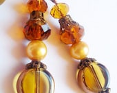 Lovely bronze dangle crystal vintage look boho earrings..handmade by i.p.