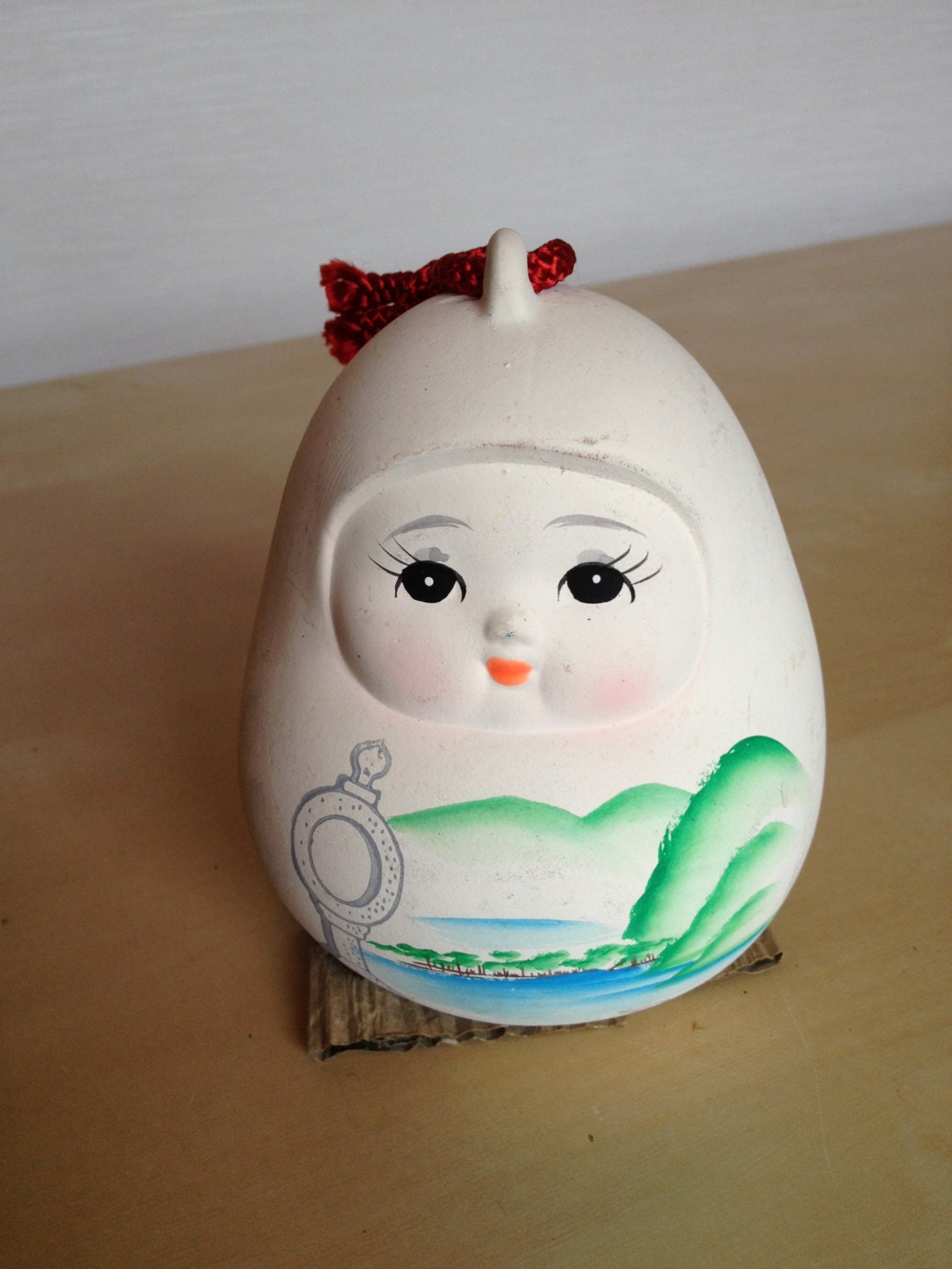 Japanese folk craft clay/ pottery daruma-shaped scenic souvenir bell