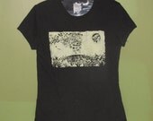 posada tshirt - earth as it is in heaven - black t shirt w yellow, medium - art collage jose posada woodcut print unisex woman girl geekery