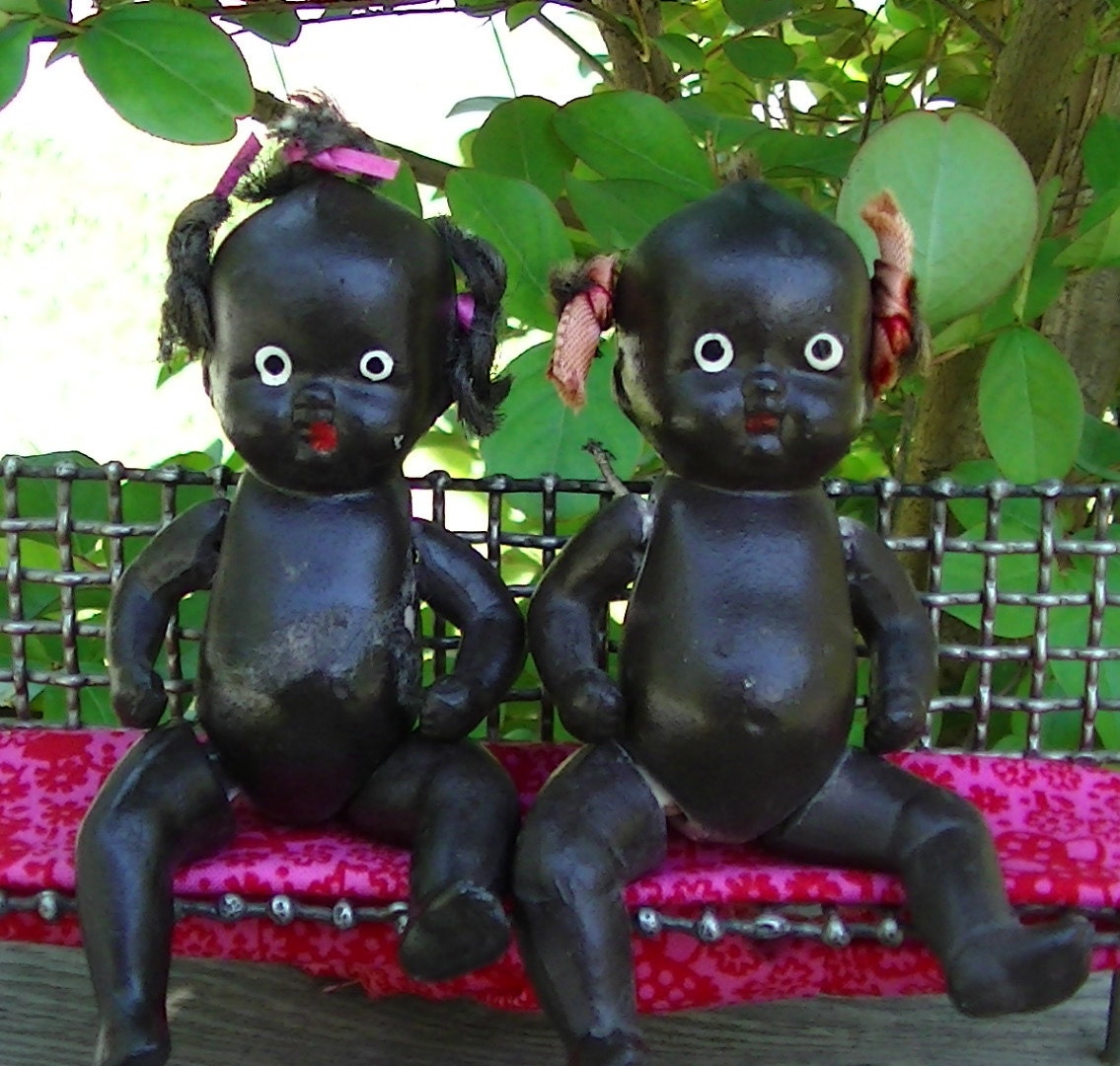 Pair of black bisque baby dolls from the 1930s