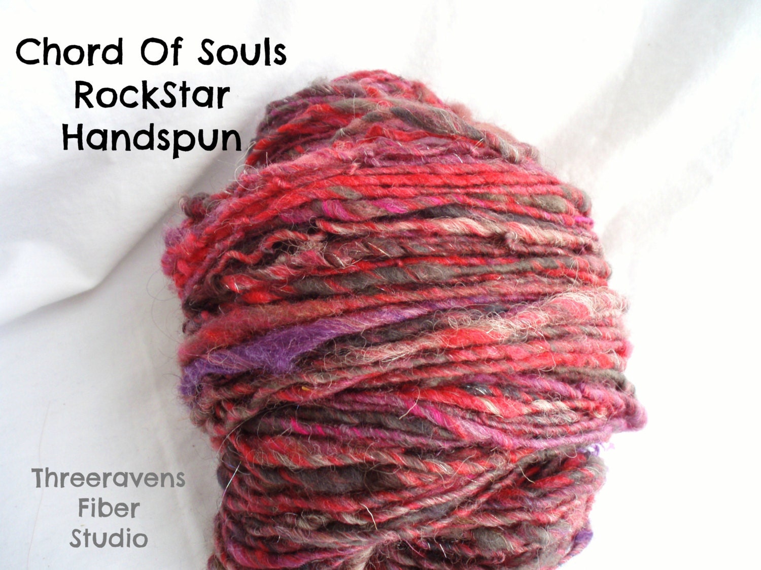 Chord of Souls RockStar Handspun Yarn - 102 yards - lightly thick and thin, reddish tones