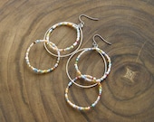 Interlinked. Random Rainbow circles. 3-Dimensional Structural Hoop dangle earrings.