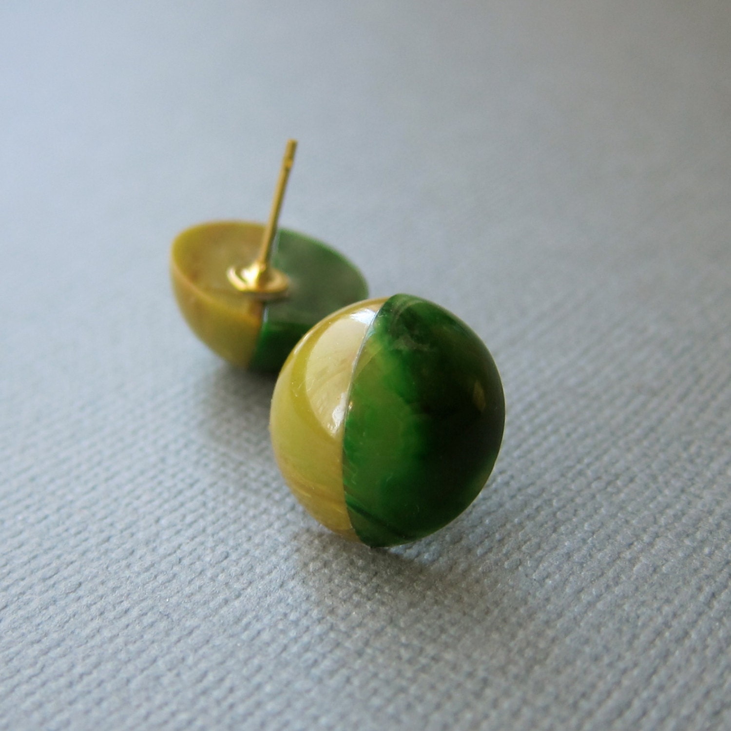 Tiny Vintage Bakelite Post Earrings. emerald and olive.