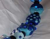 Sets of six coordinating lampwork beads