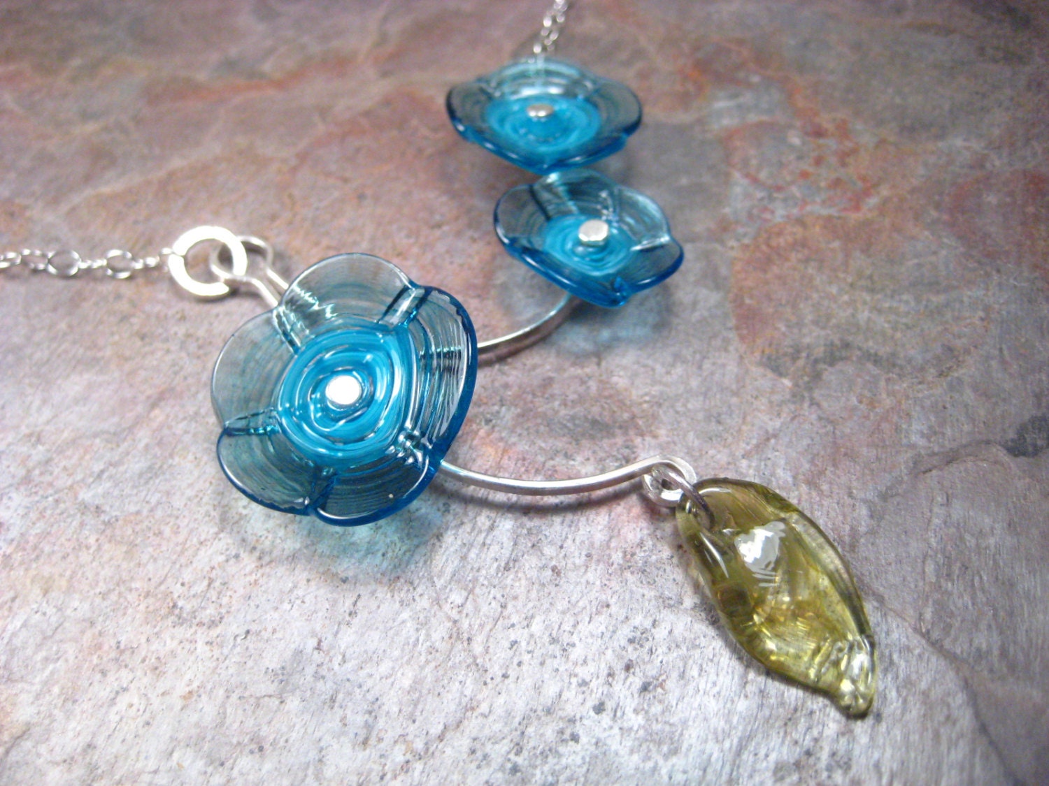 blossoms and leaf with silver necklace - veiled blue
