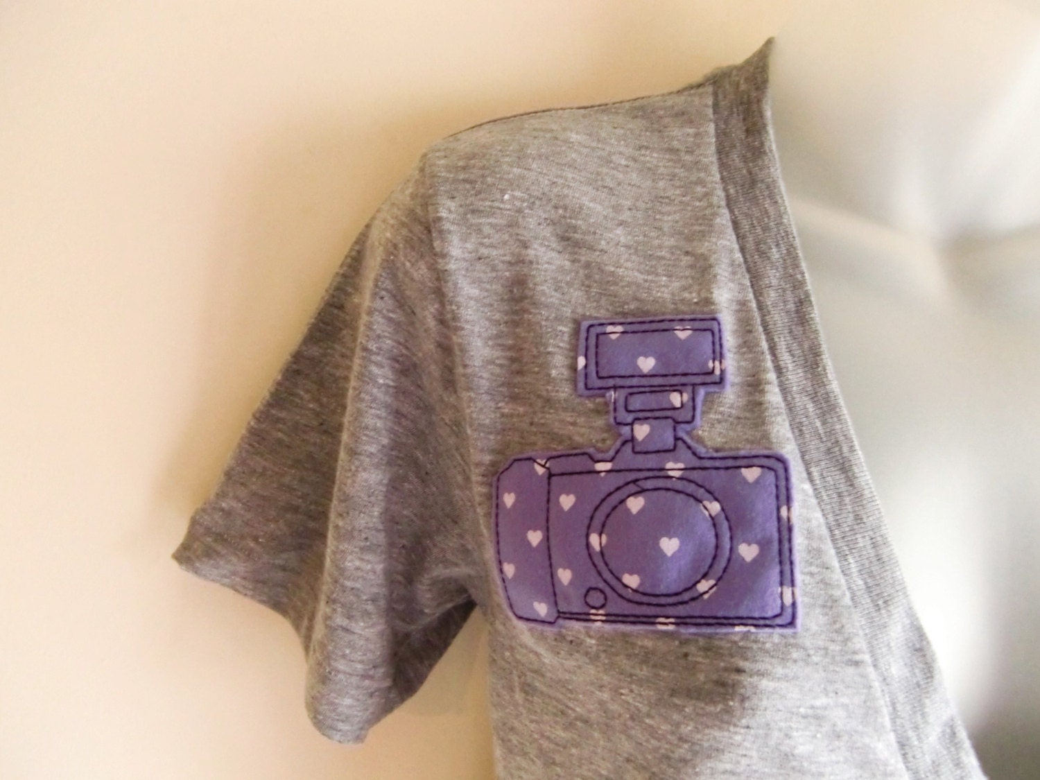 Deep V-neck t-shirt with Lilac Camera with Hearts Patch Applique