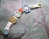Antique Button & Buckle Bracelet, Bakelite, Old Lace, Teal Blue, Green, Pink, Mother of Pearl, Pretty