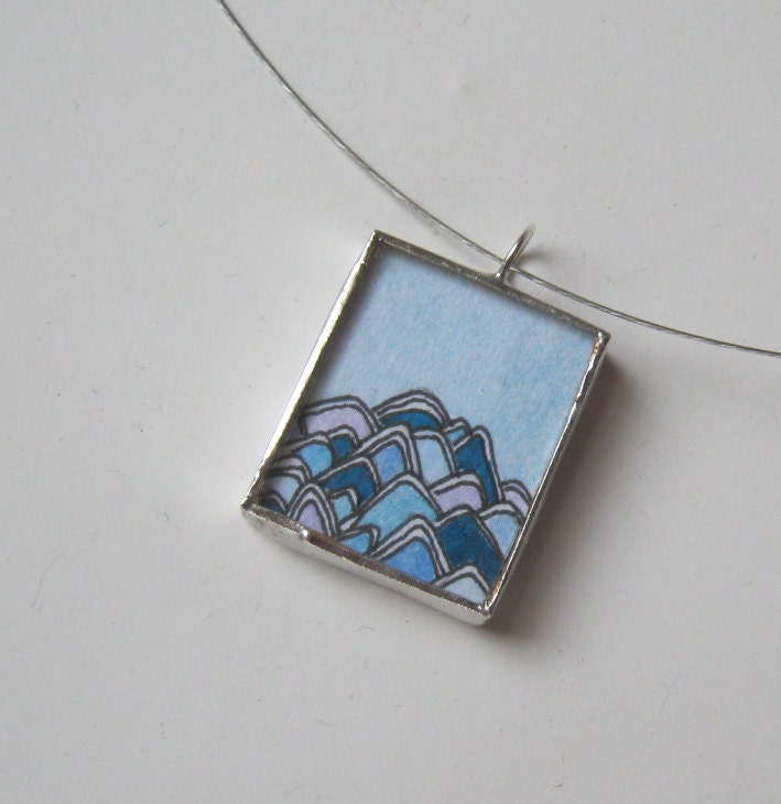 mountain feather necklace reversible text on back