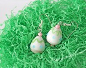 Lampwork Glass Easter Egg Earrings Eggshell White with Blue Pink and green. Dangle, hook style earrings. on Hypoallergenic surgical steel.