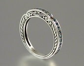 CARYATID wedding band in sterling silver with London Blue Topaz.