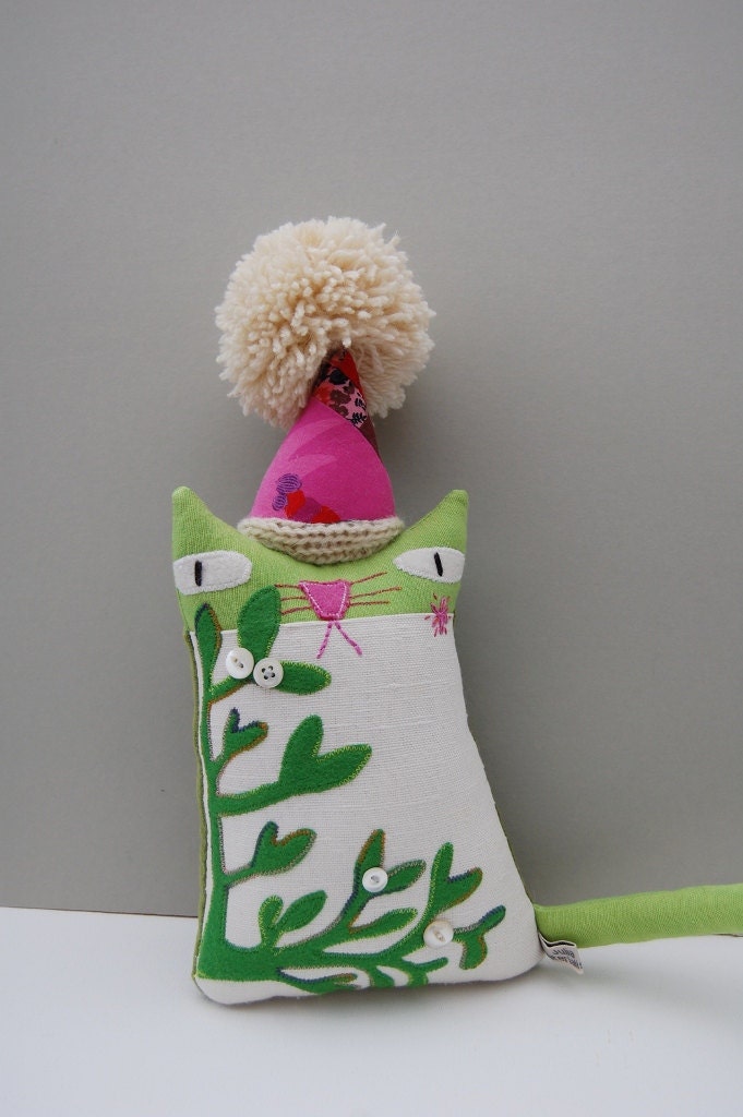 Textile art ornamental cat doll called Mistletoe
