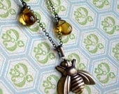 Bee's Knees: bronze honey bee and golden honey charm necklace