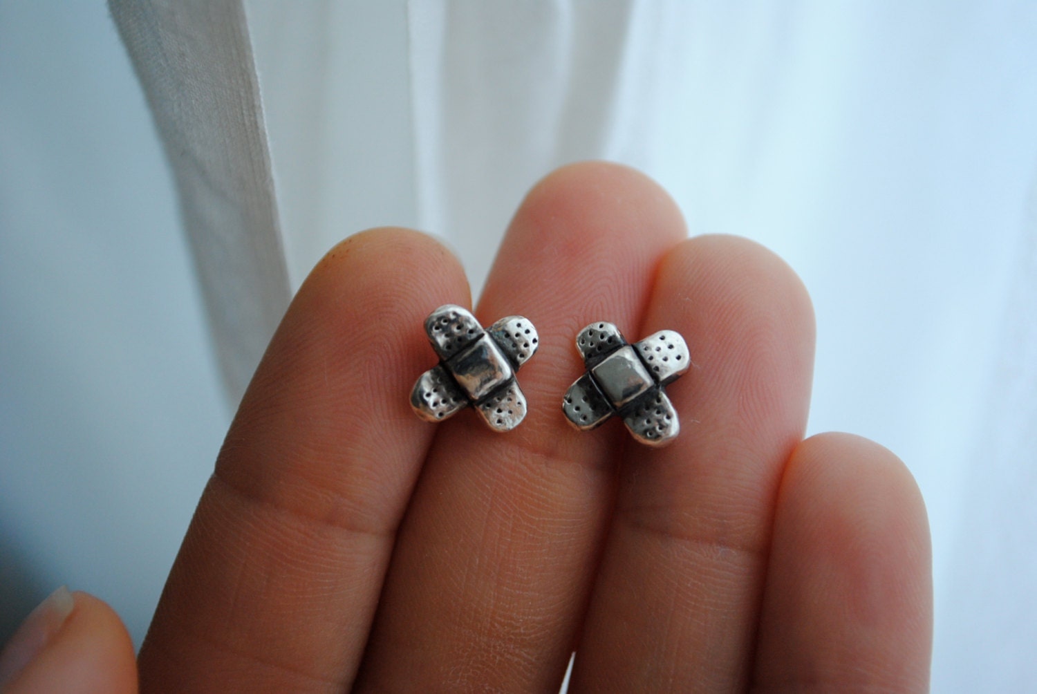 Deluxe Silver Band Aid Studs Classic X
