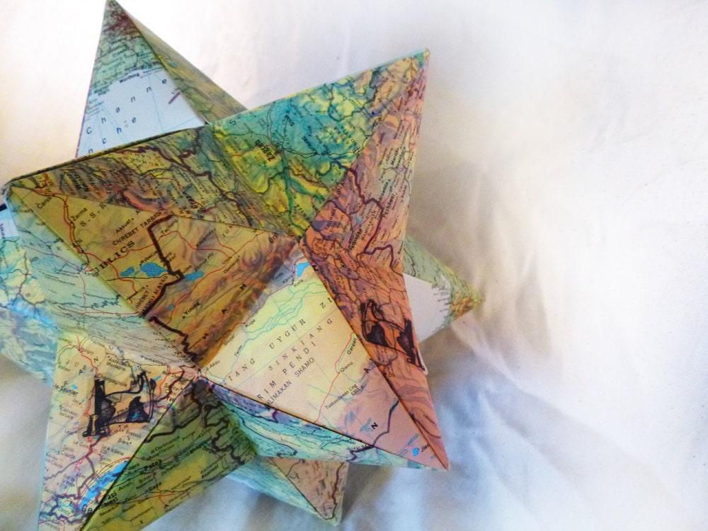 Star shaped map origami- Geometric star origami made from maps- with repeating cow image