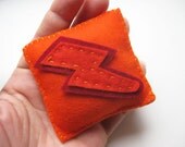 colorful felt tooth fairy pillow with lightning bolt, in carrot and red, custom with initial, made to order