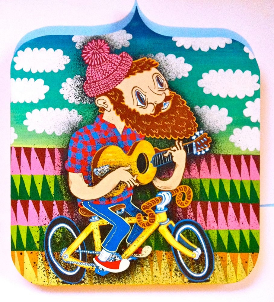 Bicycle rider playing guitar