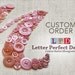 Custom Letter 'I' Monogram in Orange Buttons on 8"x10" Canvas -- Reserved for 'jholweger'