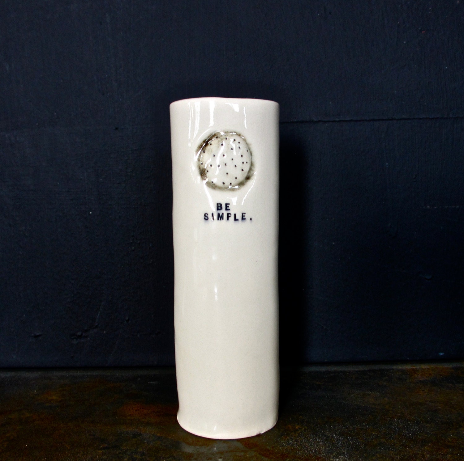 BE SIMPLE porcelain vase.