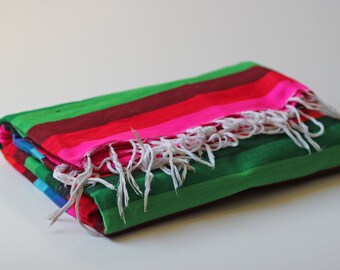 multi colored striped serape mexican blanket