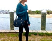 Small Larch leather bag in black // large back pocket