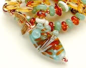 SOLD  Glacier Blue Ice and Caramel Lampwork Bead Necklace