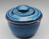 blue lidded jar with white glaze inside, dark clay, great for serving