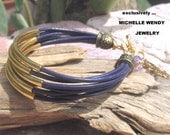 Sale ...BANGLE UP .. 8 Strands Dark Violet Leather Cuff BRACELET Gold Tube Beads Hamsa Crystal Charms Artisan Jewelry Boho