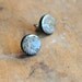 Geography post earrings in gold and cream