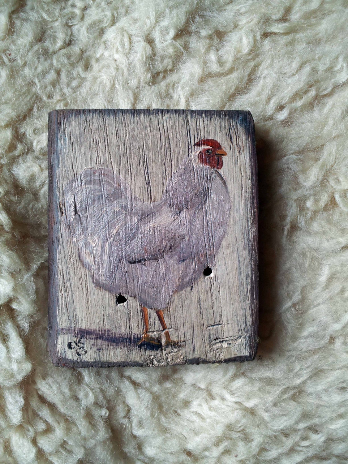 Rooster on oak